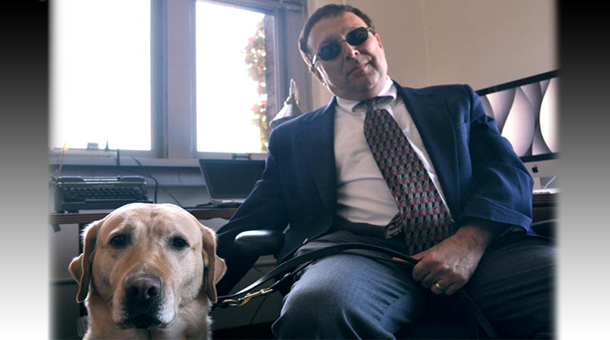 Image of Professor Stephen Kuusisto with his guide dog Nira