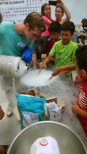 students participating in science experiment