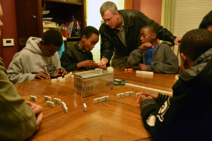 Boys playing dominoes