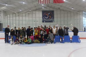 Children and college students ice skating