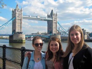 students posing in front of London Bridge