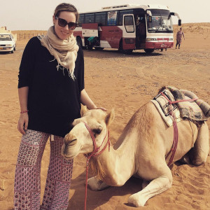 Rachel Bass posing with a camel
