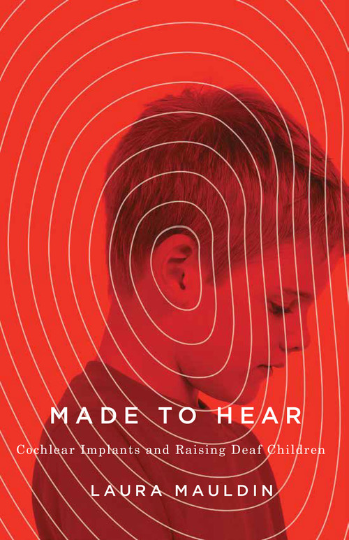 Image description: A book cover featuring a profile photograph of a young, white boy as he looks slightly downward. The picture is a saturated red color with white lines emanating from the boy's ear outward to the edge of the book, suggesting sound waves. Overlaid on that in white letters is the title of the book. 