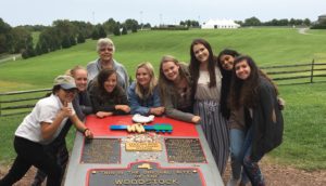 students and professor at Woodstock monument