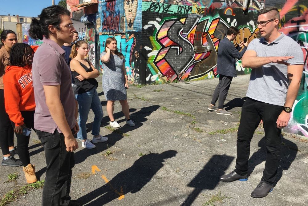 Tim VanBeveren, a Syracuse graffiti artist, talks to the Art in Life class class about art, gentrification and why he does art.