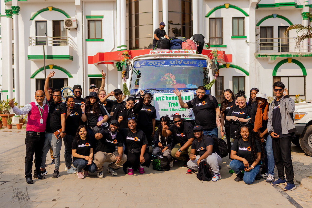 buildOn volunteers in front of van