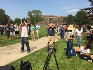 a class viewing a solar eclipse