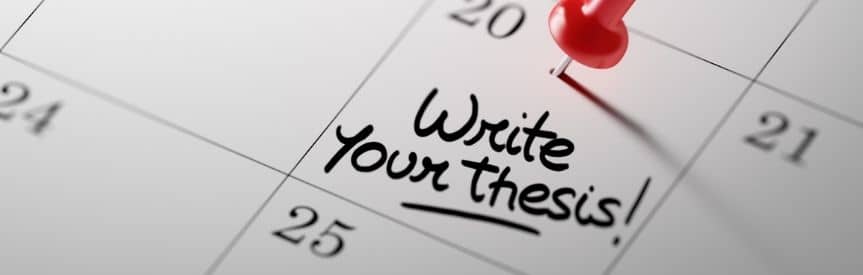 Calendar with "write your thesis" written in bold marker and a red push pin